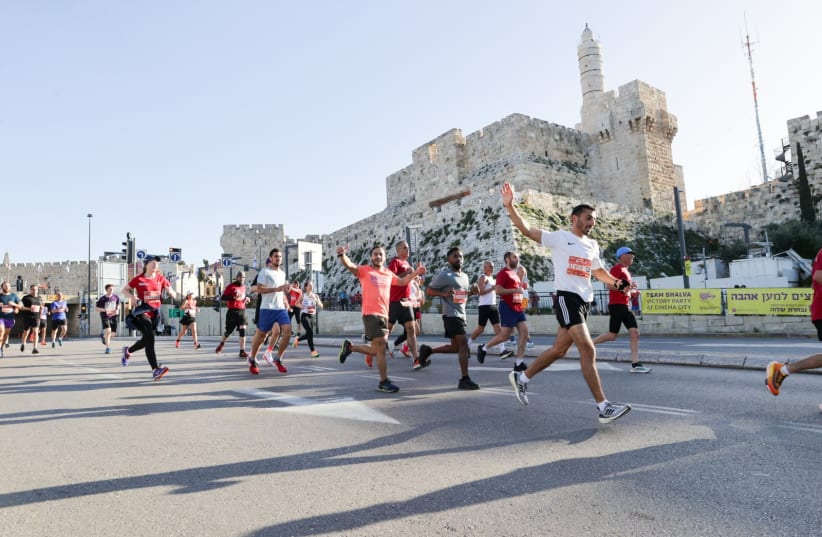  RUNNERS PARTICIPATE in previous editions of the Jerusalem Marathon, which will take place for the 13th time on March 8 in the Israeli capital. (photo credit: Jerusalem Marathon/Courtesy)