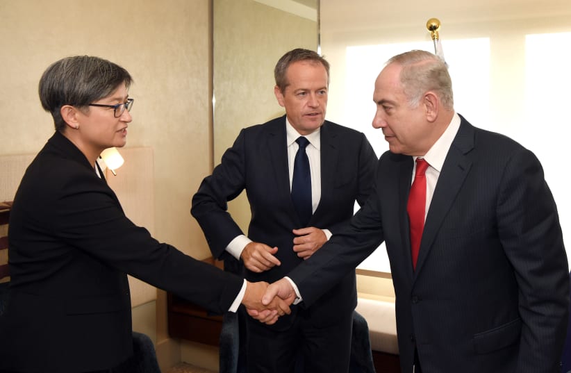  Bill Shorten (C), leader of Australia's opposition Labor Party introduces Australian Labor Party Senator Penny Wong to Israel's Prime Minister Benjamin Netanyahu (R) during their meeting in Sydney, Australia, February 24, 2017. (photo credit: REUTERS)
