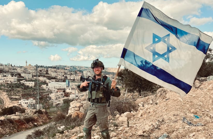  MYRON SHNEIDER found this flag on the ground in a Palestinian village and brought it back to life.  (photo credit: COURTESY MYRON SHNEIDER)