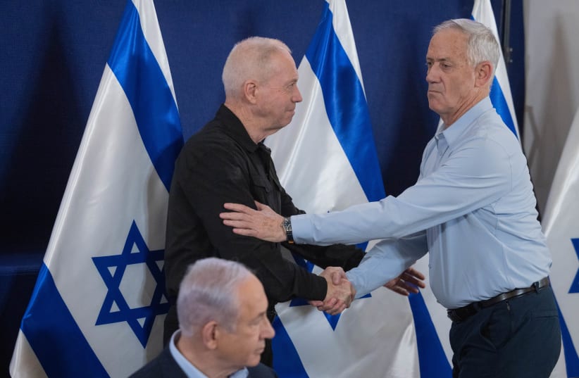  PRIME MINISTER Benjamin Netanyahu, Defense Minister Yoav Gallant, and Minister Benny Gantz attend a press conference at the Defense Ministry in November.  (photo credit: Chaim Goldberg/Flash90)