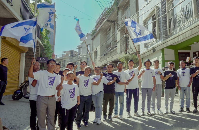  Bnei Menashe community members demonstrating their support for Israel and demanding the release of the hostages. (photo credit: COURTESY OF SHAVEI ISRAEL)
