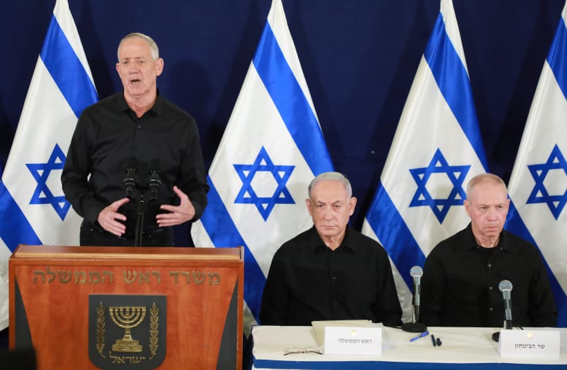  Israeli prime minister Benjamin Netanyahu, Minister of Defense Yoav Galant, and head of the National Unity party Benny Gantz hold a joint press conference at the Ministry of Defense, in Tel Aviv. October 28, 2023.  (photo credit: Dana Kopel/Pool)