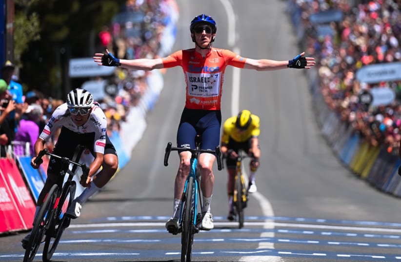   ISRAEL - PREMIER TECH cyclist Steve Williams celebrates as he crosses the finish line to seal his victory in Sunday's Tour Down Under race in Australia.  (photo credit: SPRINT CYCLING)