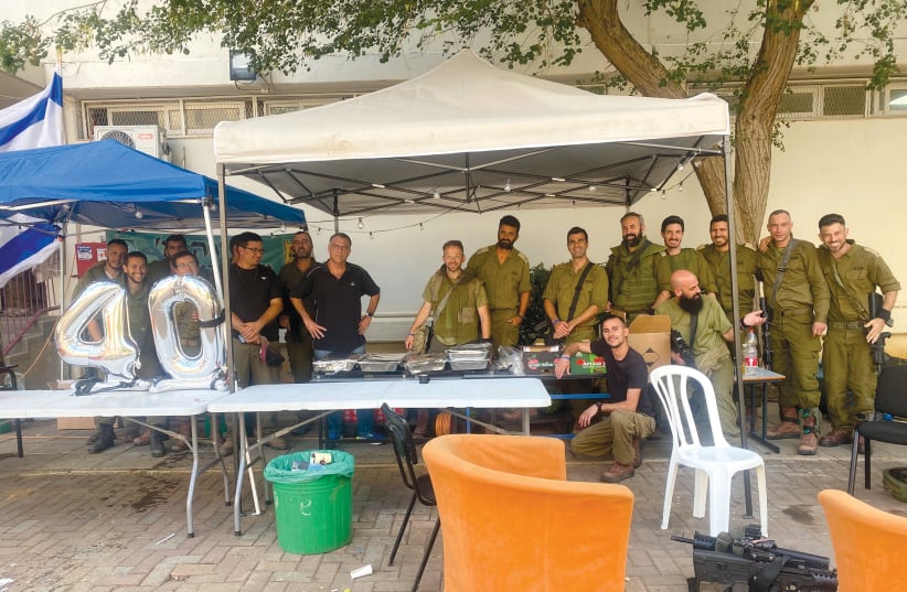  Hungry IDF soldiers welcome a Shabbat meal at their base.  (photo credit: ETHAN KUSHNER)
