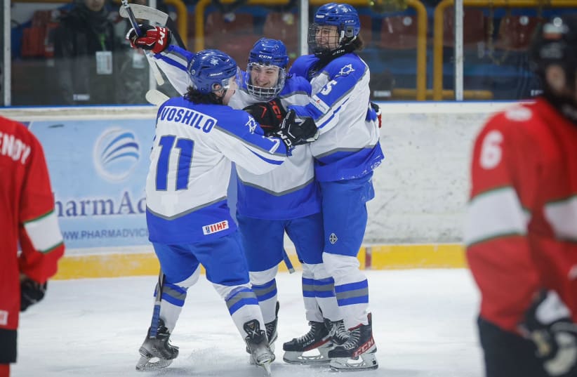 TEAM ISRAEL players celebrate after one of their seven goals in the 7-3 victory over host Bulgaria at the IIHF U20 World Championship on Tuesday night to improve to 2-0 at the tournament. (photo credit: Courtesy)