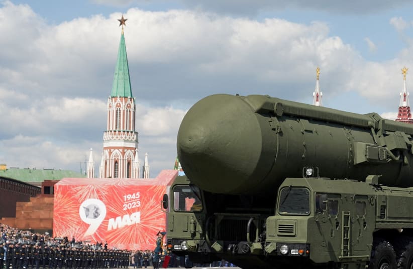   A Russian Yars intercontinental ballistic missile system drives during a military parade on Victory Day, which marks the 78th anniversary of the victory over Nazi Germany in World War Two, in Red Square in central Moscow, Russia May 9, 2023.  (photo credit: Pelagiya Tikhonova/Moscow News Agency/Handout via REUTERS)