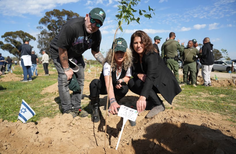 The families of October 7 Nova music festival victims participate in an tree-planting ceremony together with KKL-JNF at the Re’im Forest on January 21, 2024. (photo credit: Yossi Ifergan/KKL-JNF Photo Archive)