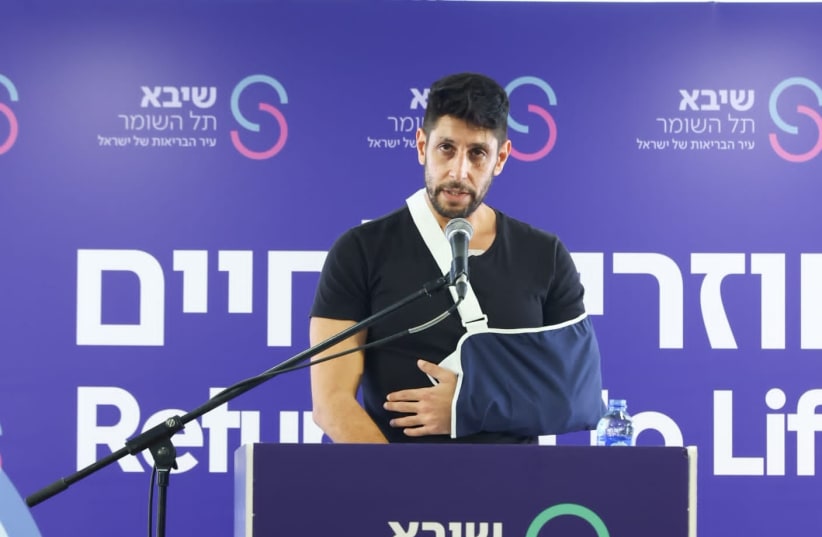  Idan Amedi speaks at Sheba Tel HaShomer medical center in his first public appearance since being injured in the Gaza Strip, January 25, 2024 (photo credit: ERAN LAM)