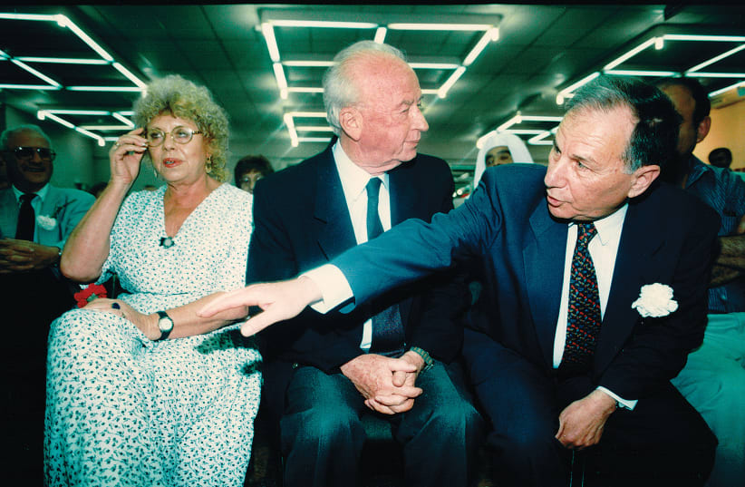 AMNON RUBINSTEIN (right) with then-prime minister Yitzhak Rabin and Shulamit Aloni, in 1994.  (photo credit: MOSHE SHAI/FLASH90)