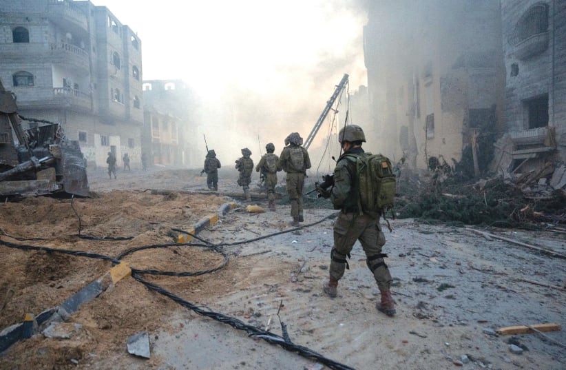  DF SOLDIERS operate in the Gaza Strip last week. Our government may tell us otherwise, but we will need a long time to be fully victorious, argues the writer. (photo credit: IDF)