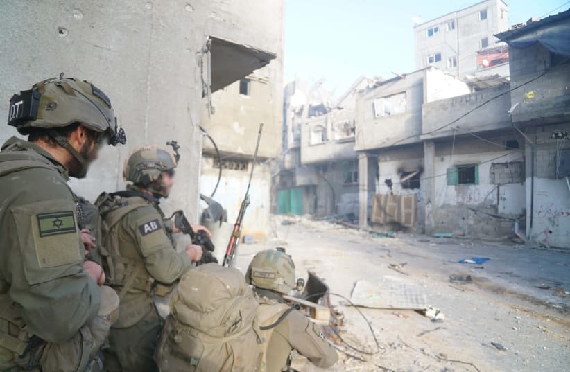  IDF troops are seen operating in Khan Yunis, Gaza. January 29, 2024. (photo credit: IDF SPOKESPERSON'S UNIT)