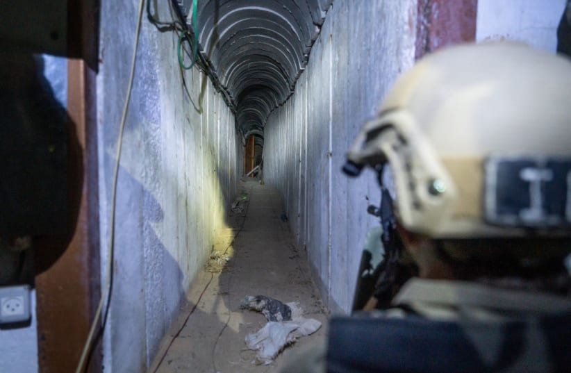  IDF soldiers clear a tunnel in the Gaza Strip (photo credit: IDF SPOKESPERSON'S UNIT)