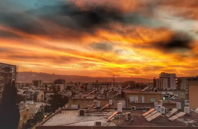  Kiryat Ata sunset March 18, 2018 (photo credit: Amir Goldstein, REUVEN CASTRO)