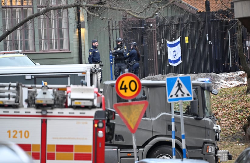  Emergency workers stand near the Israeli embassy in Stockholm, January 31, 2024 (photo credit:  HENRIK MONTGOMERY/TT NEWS AGENCY/VIA REUTERS)