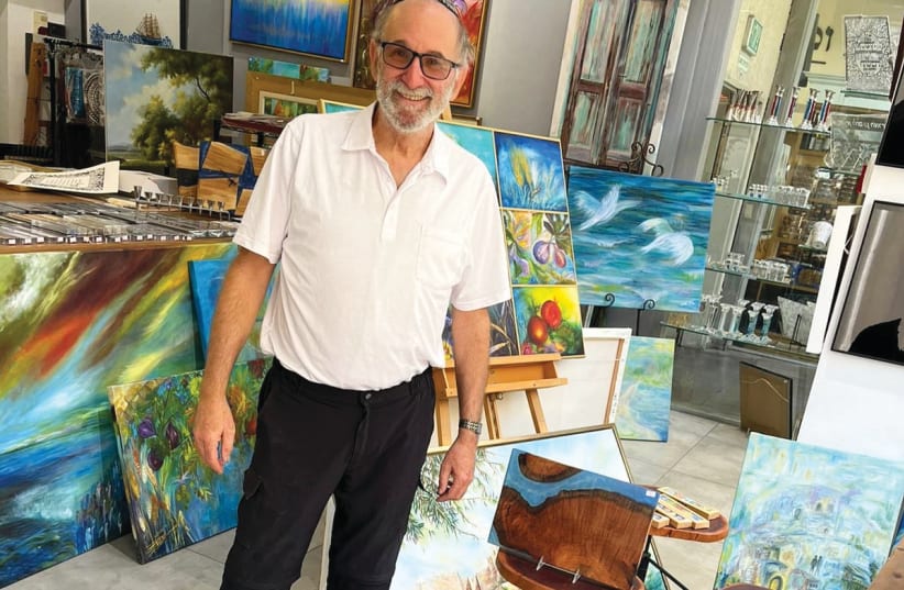  WITH HIS epoxy work dislayed in a Beit Shemesh art store. (photo credit: COURTESY YEHUDIS SCHAMROTH)