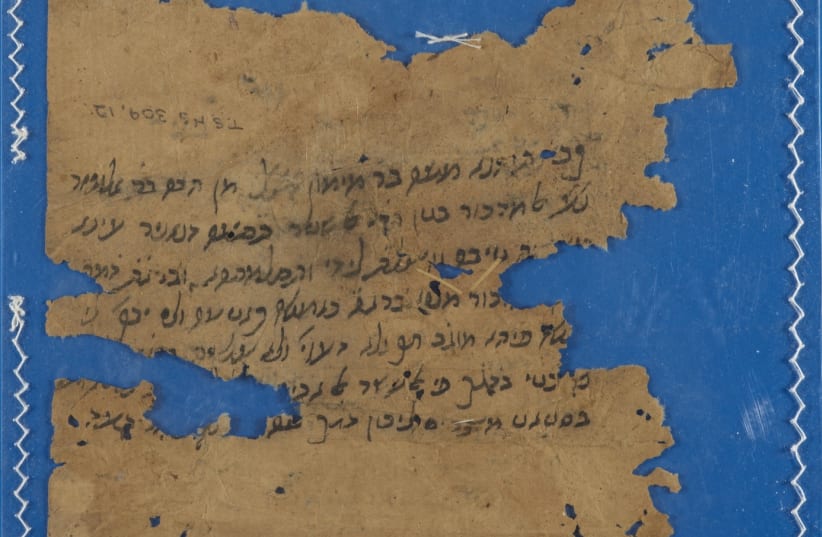A receipt written by Maimonides himself for funds raised to ransom Jewish captives taken after the Crusader assault on Bilbeis in northeast Egypt. (photo credit: Cambridge University Library and YU)