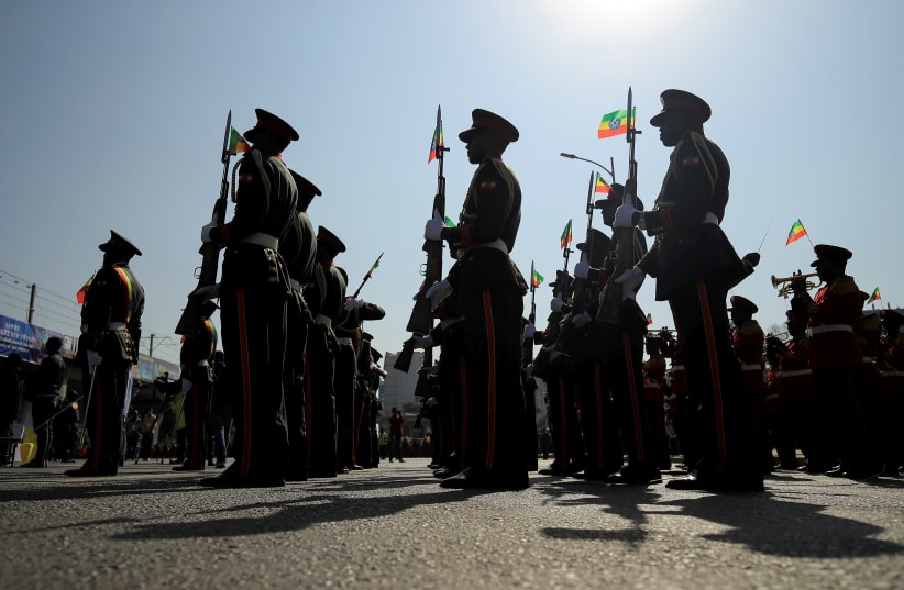  Members of the Ethiopian National Defense Force are seen during a pro-government rally to denounce what the organisers say is the TPLF and the Western countries' interference in internal affairs of the country, at Meskel Square in Addis Ababa, Ethiopia, November 7, 2021. (photo credit: REUTERS/TIKSA NEGERI)