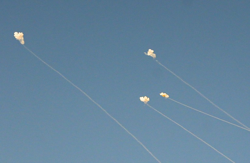  An Israeli anti missile system intercept rockets fired from Lebanon as it seen from the Israeli side of the border, on November 7, 2023. (photo credit: AYAL MARGOLIN/FLASH90)