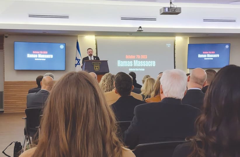  PASTOR LARRY HUCH speaks at an Israel Embassy event showing footage of the Hamas October 7 massacre.  (photo credit: LARRY HUCHMINSTRIES)