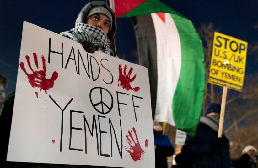  People protest the U.S. and UK strikes across Yemen against Iran-backed Houthi forces, at a rally in Seattle, Washington, U.S., January 12, 2024 (photo credit: REUTERS/DAVID RYDER)