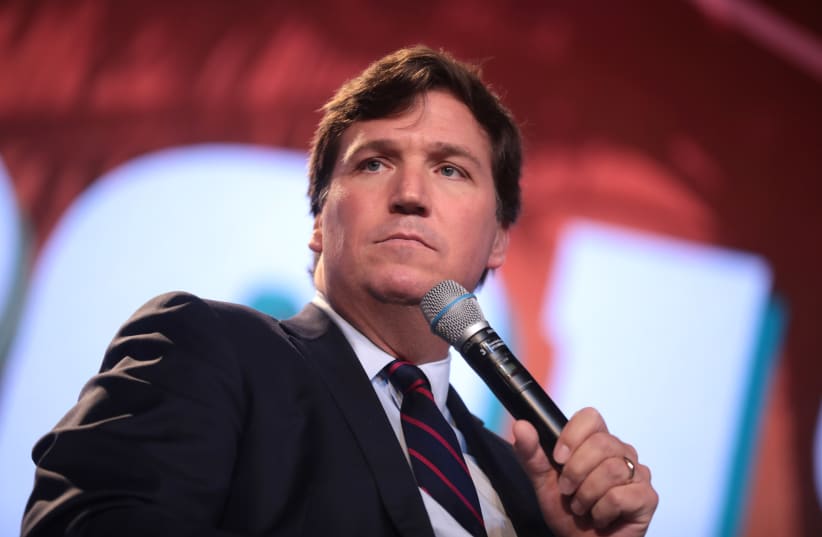  Tucker Carlson speaking with attendees at the 2018 Student Action Summit hosted by Turning Point USA at the Palm Beach County Convention Center in West Palm Beach, Florida. (photo credit: GAGE SKIDMORE / CC-SA 2.0)