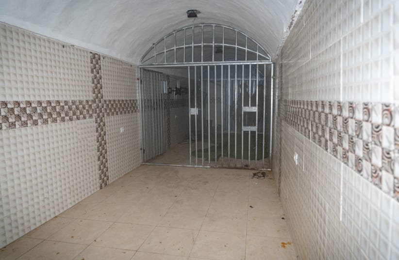   Inside view of a tunnel infrastructure, including a makeshift kitchen and a cage, in Gaza (photo credit: IDF SPOKESPERSON'S UNIT)