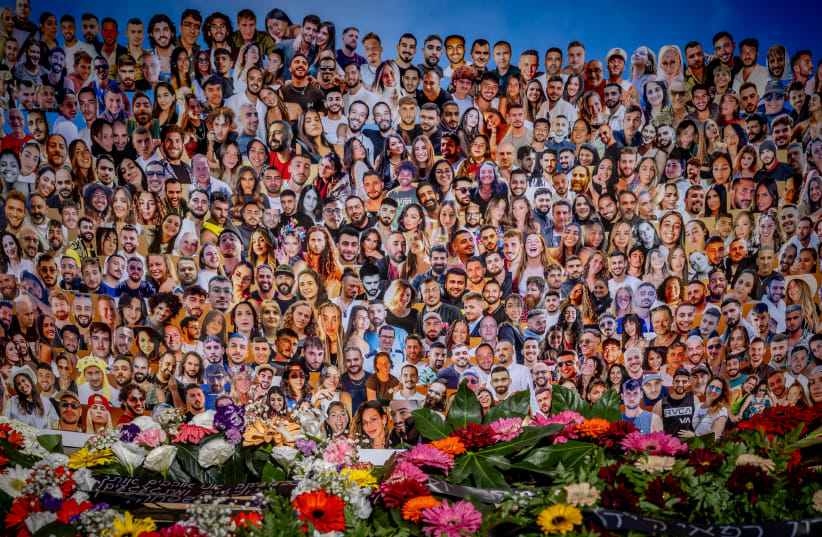  Pictures of Israelis who were murdered by Hamas terrorists at the Nova festival place outside the Israeli parliament in Jerusalem on February 7, 2024.  (photo credit: YONATAN SINDEL/FLASH90)