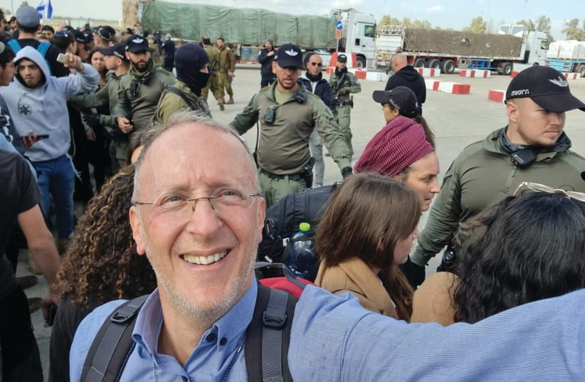  THE WRITER at the Kerem Shalom crossing this week: ‘After four months of fighting in Gaza, the most humanitarian action at this point is a short blockade to put pressure on the Gazan people to finish this war,’ he argues. (photo credit: Leo Dee)