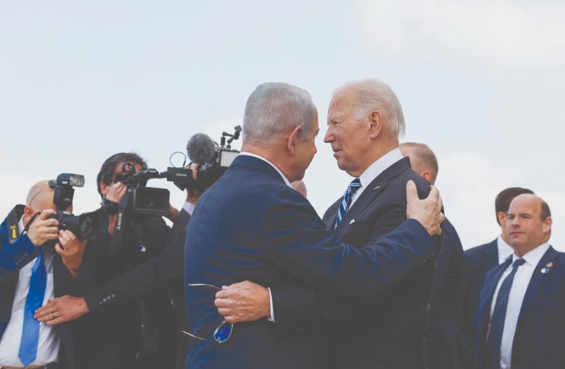  US PRESIDENT Joe Biden is welcomed by Prime Minister Benjamin Netanyahu, in October, when the president visited Israel following the massacres carried out by Hamas.  (photo credit: EVELYN HOCKSTEIN/REUTERS)