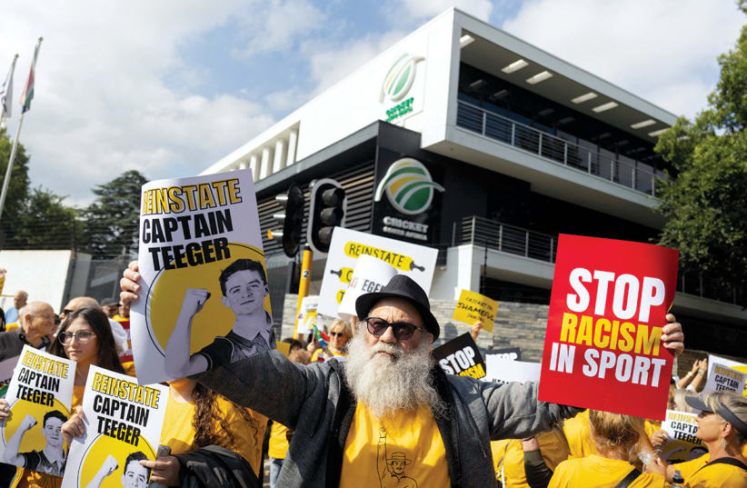  People protest outside Cricket South Africa (CSA) headquarters on January 18 after the removal of David Teeger as captain of the South African Under-19 team.  (photo credit: Alet Pretorius/Reuters)