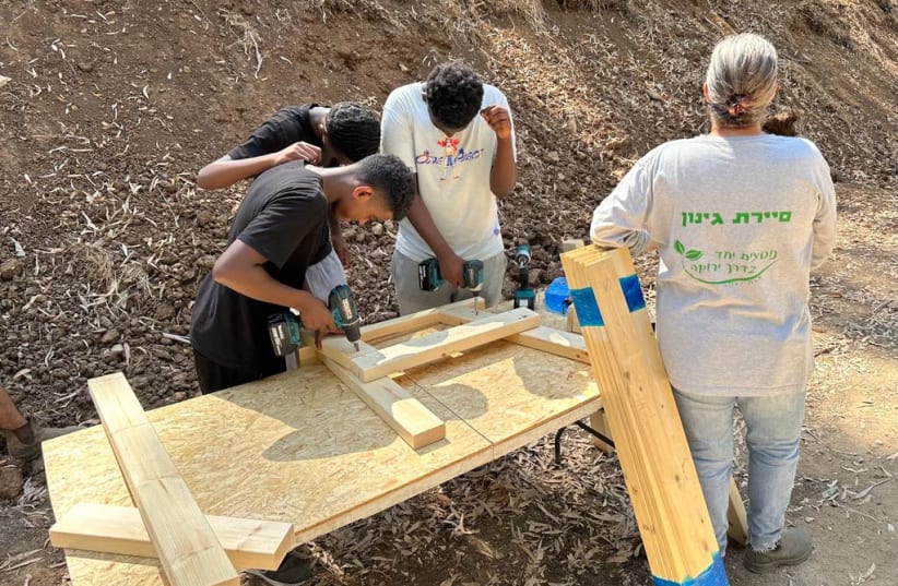   Israeli teens from disadvantaged backgrounds attend a carpentry workshop supported by KKL-JNF. (photo credit: Courtesy of Merchavim Institute )
