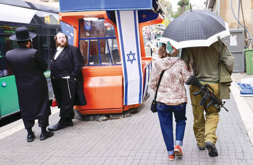  WHEN QUESTIONED about discrimination in state budget allocations, ultra-Orthodox respondents overwhelmingly felt they were treated unfairly, while secular respondents tended to deny such discrimination. (photo credit: MARC ISRAEL SELLEM/THE JERUSALEM POST)