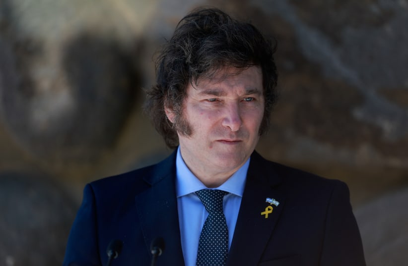  Argentina's President Javier Milei looks on during a visit to Yad Vashem, the World Holocaust Remembrance Centre, in Jerusalem, February 7, 2024. (photo credit: REUTERS/AMMAR AWAD)