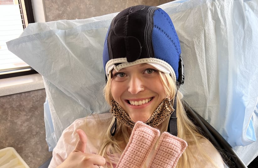  Bailey Kramer was able to keep most of her hair during chemotherapy treatments using a method called cold-capping in which a specially fitted cap freezes the hair follicles during treatment, preserving the strands. (photo credit: COURTESY OF BAILEY KRAMER)