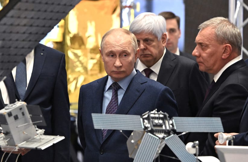  Russia's President Vladimir Putin, accompanied by head of the Roscosmos space corporation Yuri Borisov, visits the centre of the Rocket and Space Corporation "Energia" in Korolyov outside Moscow, Russia, October 26, 2023.  (photo credit:  Sputnik/Sergei Bobylev/Pool via REUTERS )