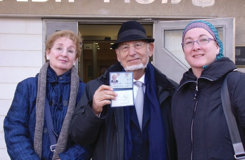  WITH HER parents when they made aliyah in 2011, well after her own. Then-interior minister Eli Yishai personally granted her father his ‘teudat zehut’ as a sign of appreciation for rabbis who served Jewish communities abroad. (photo credit: Courtesy Leah Haziza)