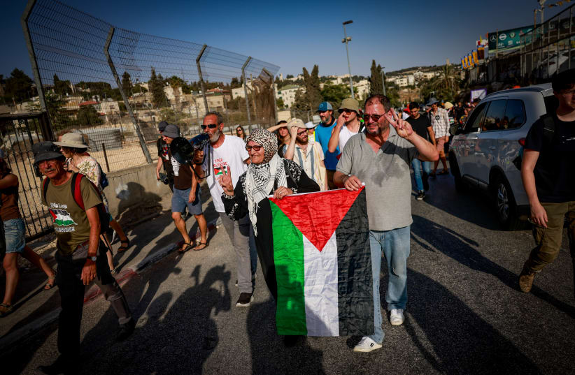  MK Ofer Cassif, Palestinians and left wing activists protest in the east Jerusalem neighborhood of Sheikh Jarrah, on September 8, 2023 (photo credit: Chaim Goldberg/Flash90)