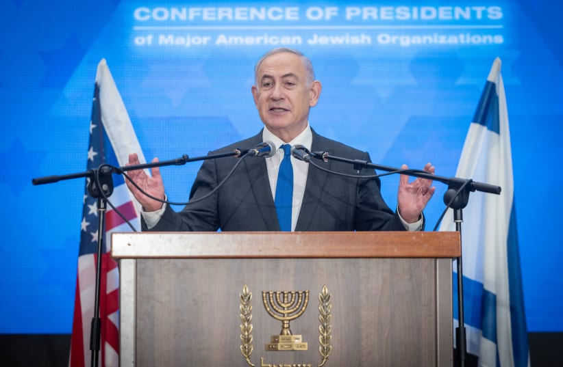Prime Minister Benjamin Netanyahu attends a Conference of Presidents of Major American Jewish Organizations in Jerusalem, on February 18, 2024 (photo credit: Chaim Goldberg/Flash90)