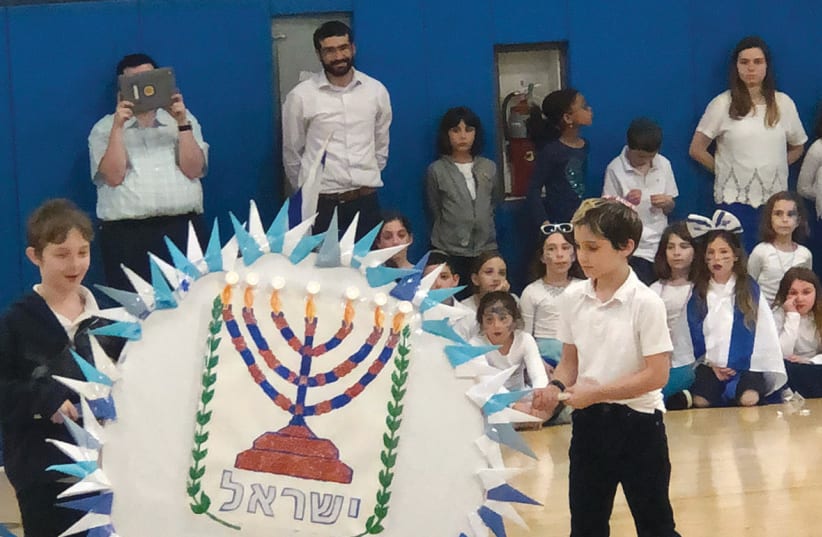  A CEREMONY marking Israel’s 70th Independence Day takes place at Ben Porat Yosef school in Paramus, NJ. (photo credit: CHERYL WEINER ROSENBERG)