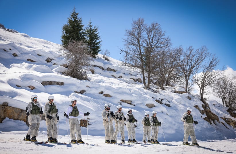  Israeli reserve soldiers belonging to the IDF Alpinist Unit, seen during a drill in Mount Hermon, northern Israel, February 7, 2024.  (photo credit: David Cohen/Flash90)