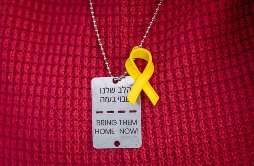 A dogtag calling to bring all the Gaza hostages home, photo taken February 19, 2024 (photo credit: Chaim Goldberg/Flash90)