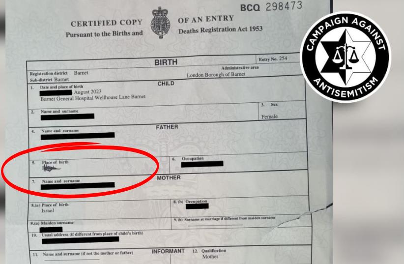 The defaced birth certificate (photo credit: CAMPAIGN AGAINST ANTISEMITISM)