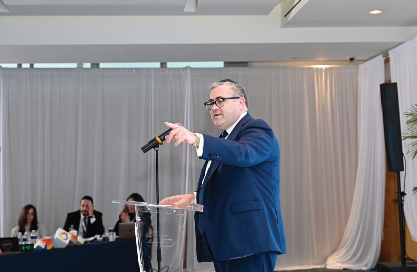  THE WRITER speaks at the Aish Global Summit in Miami, earlier this month. ‘The alarming reality we as the larger Jewish community face today, is mainly among unaffiliated Jews, our brothers and sisters who are not connected in any way to their heritage,’ he writes.  (photo credit: AISH)