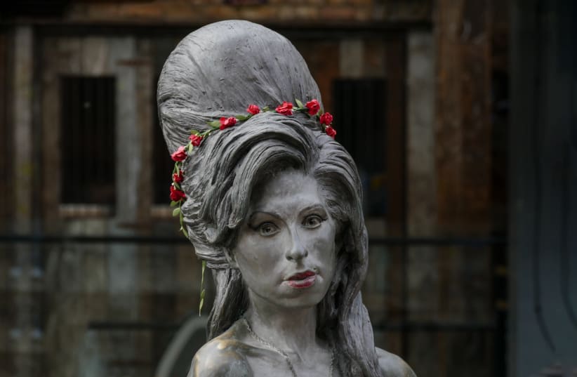  Amy Winehouse statue seen in Camden Lock, London, England, UK (photo credit: FLICKR)