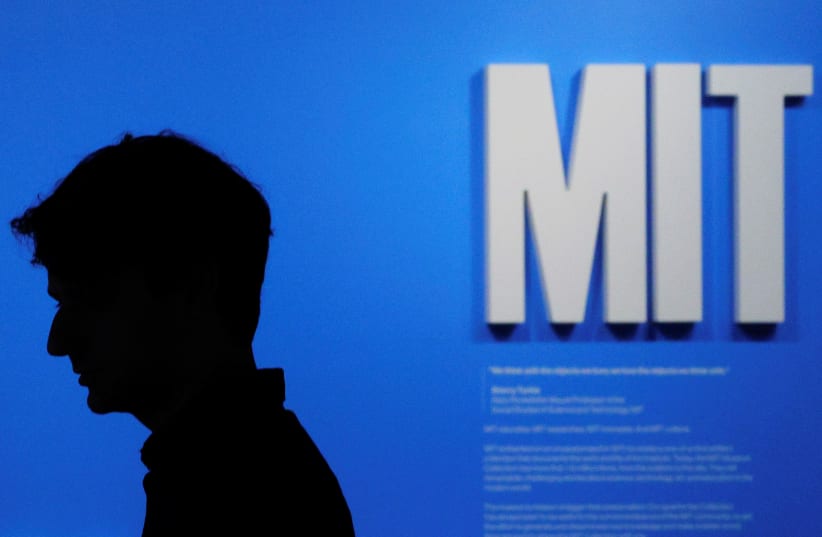  A visitor looks at an exhibit at the MIT Museum in its new location at the Massachusetts Institute of Technology in Cambridge, Massachusetts, U.S., October 6, 2022. (photo credit: BRIAN SNYDER/REUTERS)