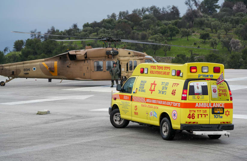  A Military helicopter evacuates injured people from the Ziv Medical center in Tzfat, after being injured earlier today from a missile fired by the terrorist organization Hezbollah to a military base in Tzfat , February 14, 2024. Photo by Ayal Margolin/Flash90 (photo credit: AYAL MARGOLIN/FLASH90)