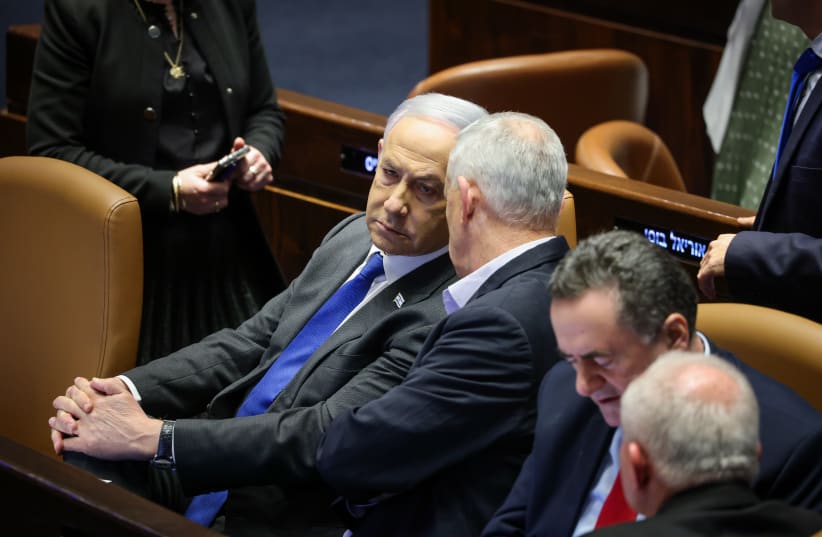 Prime Minister Benjamin Netanyahu seen in the Knesset plenum on February 21, 2024 (photo credit: NOAM MOSKOVICH/KNESSET)