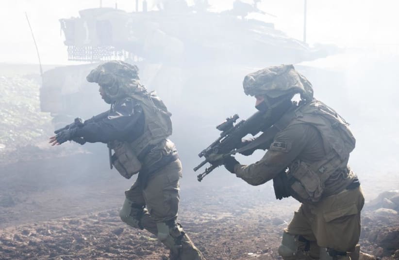  Israeli soldiers operate near the northern border with Lebanon, on February 21, 2024 (photo credit: IDF SPOKESPERSON'S UNIT)