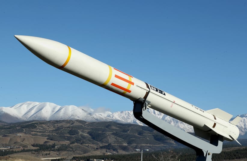  An Iranian missile is displayed during an unveiling ceremony in Tehran, Iran, in this picture obtained on February 17, 2024.  (photo credit: Iran's Defense Ministry/WANA (West Asia News Agency)/Handout via REUTERS)