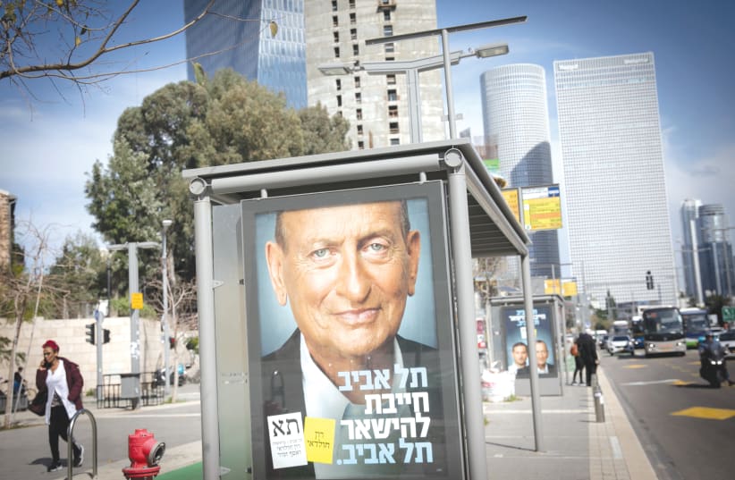  ELECTION POSTERS promote the mayoral candidacies of incumbent Ron Huldai and challenger Orna Barbivai on the streets of Tel Aviv, ahead of this week’s election. (photo credit: MIRIAM ALSTER/FLASH90)